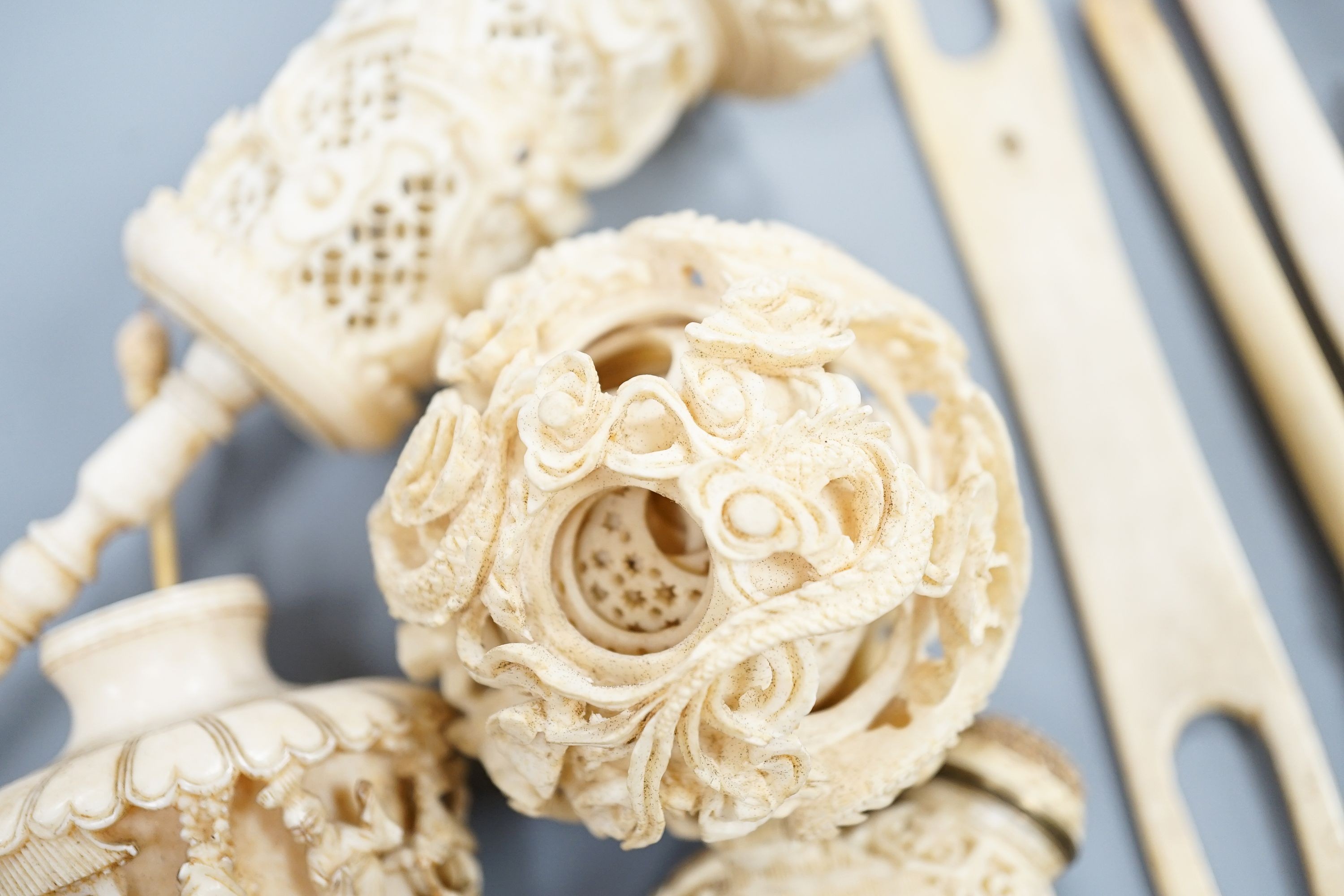A group of mixed Ivory pieces including a concentric ball and stand, 19th/early 20th century 80-120
